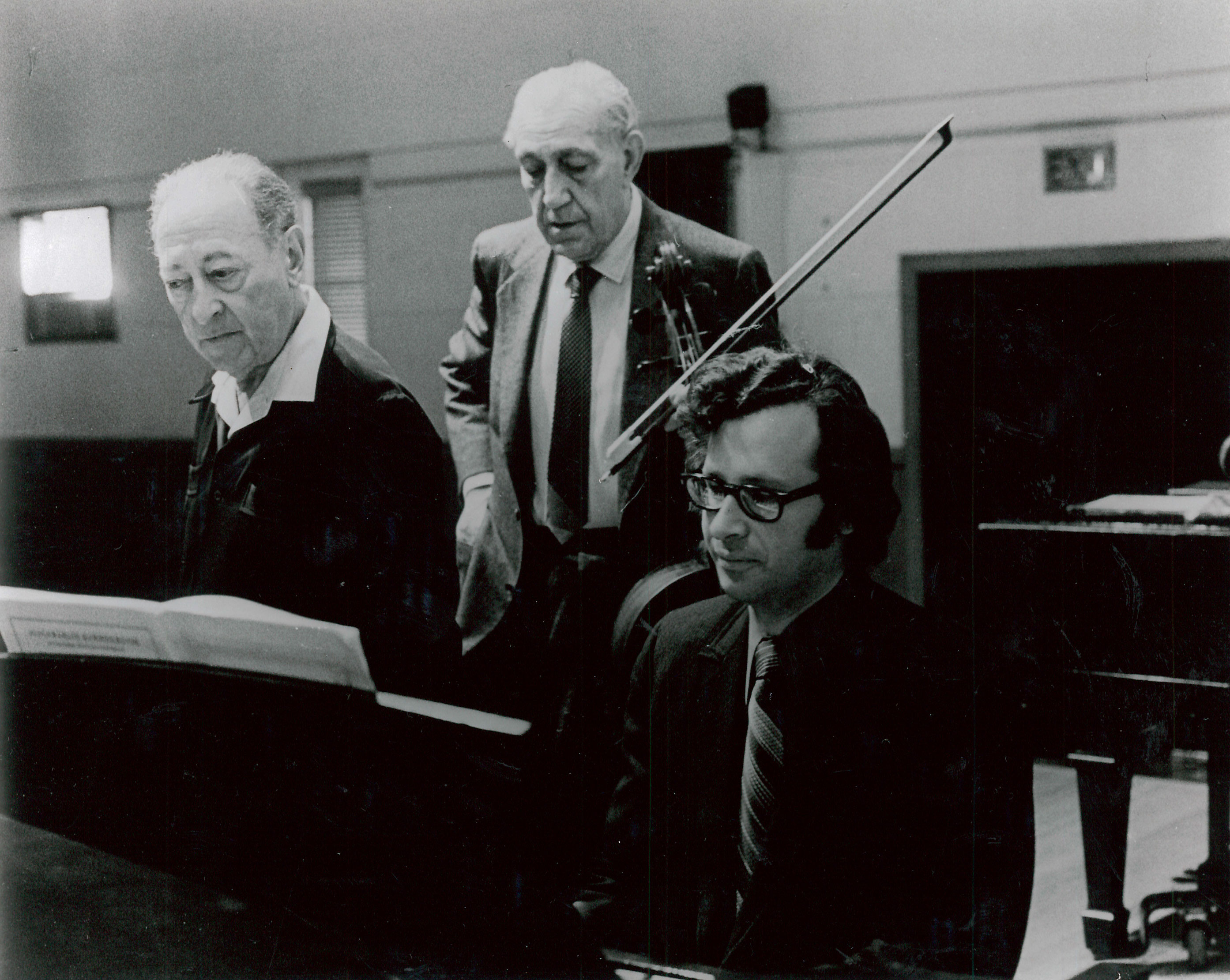 Rehearsal for performance with violinist Jascha Heifetz and cellist Gregor Piatigorsky in the Tchaikovsky Trio, USC, Los Angeles, CA